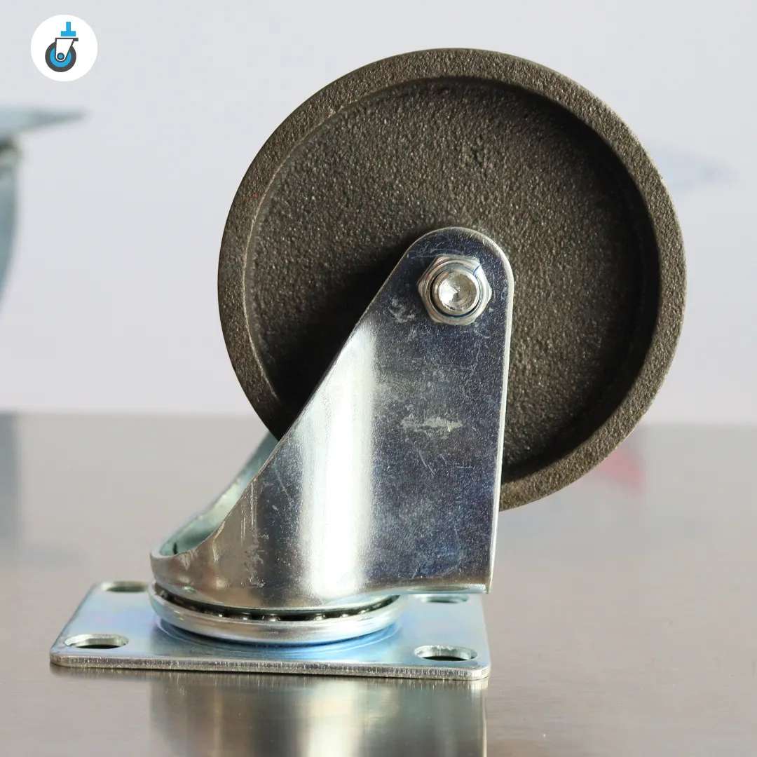 ew of swivel cast-iron wheel showing fork, axle bolt and rough-textured tread